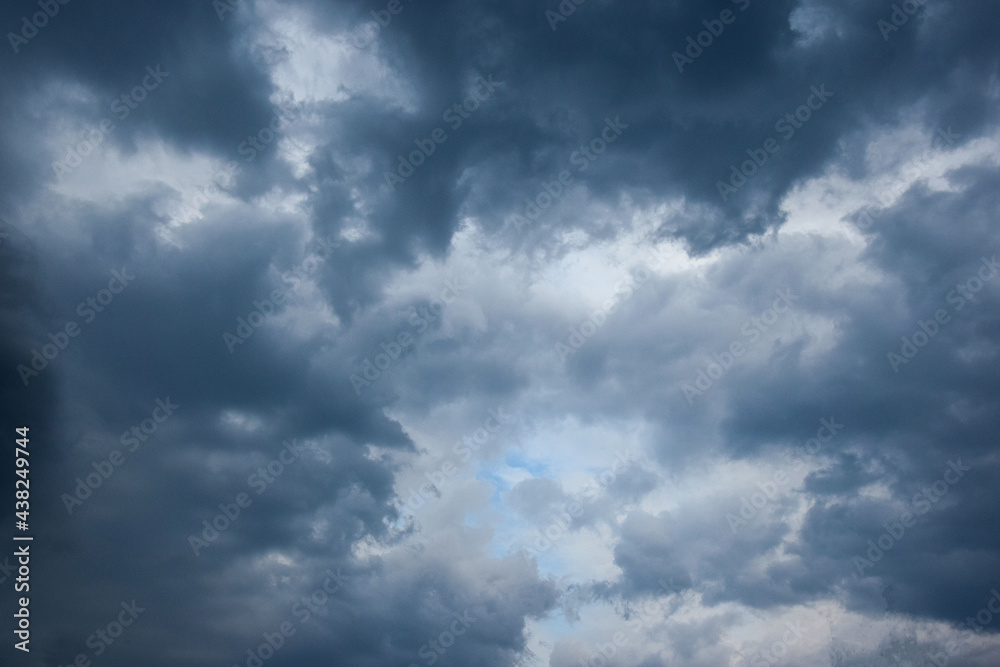 Glimpses of light in the overcast evening sky