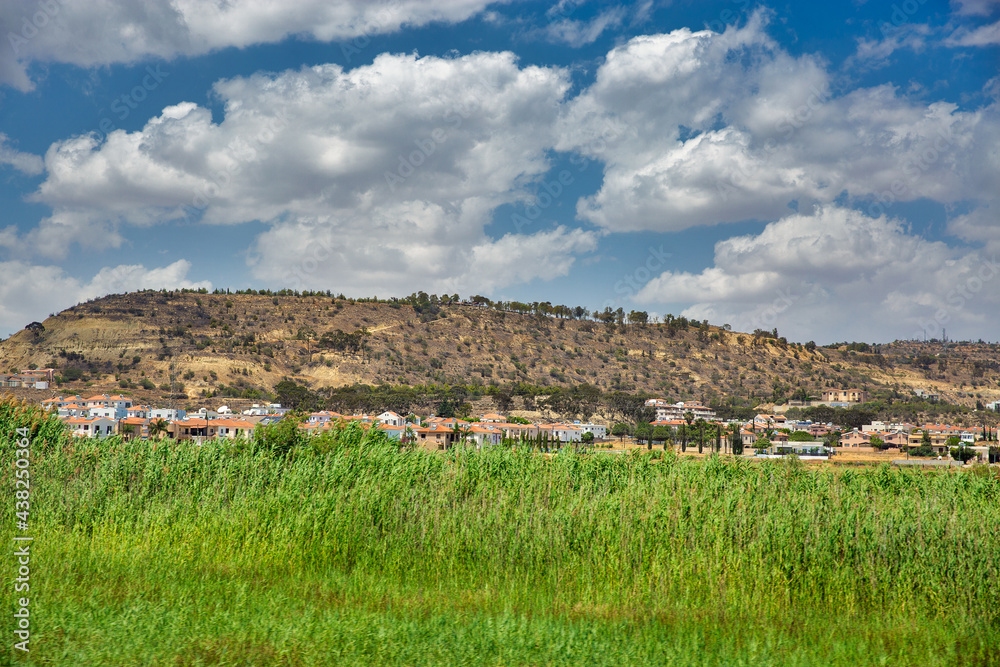 Typical Cypriot landscape wit village and hills close to Larnaca, Cyprus.