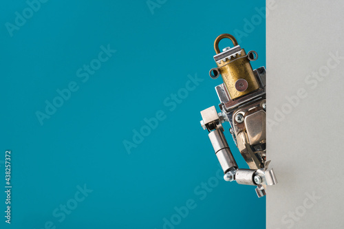 Portrait of a steampunk robot looking around the corner.