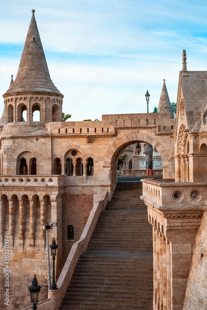 Naklejka premium Person enjoys view in Fisherman's Bastion in Budapest, Hungary