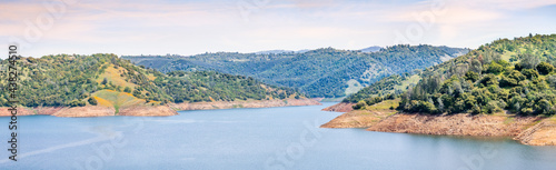 Panoramic view of New Melones Lake, a reservoir on the foothills of Sierra Mountains; California photo