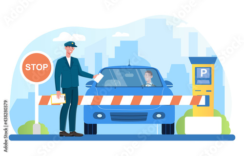 Male attendant standing at gate arm with stop sign checking vehicles