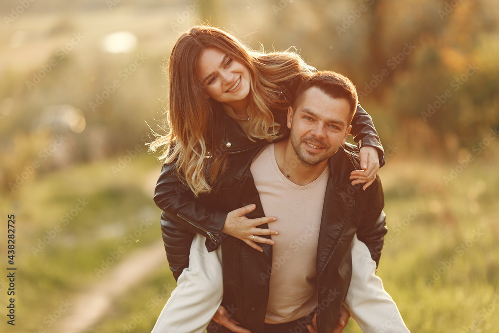 Fototapeta premium Beautiful couple spend time on a summer field