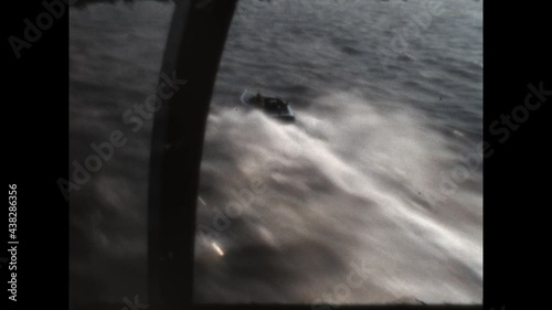 Salton City 500 Pursuit 1966

A helicopter shoots aerial chase camera footage of a speedboat racing in the Salton City 500 race on the Salton Sea in 1966. photo