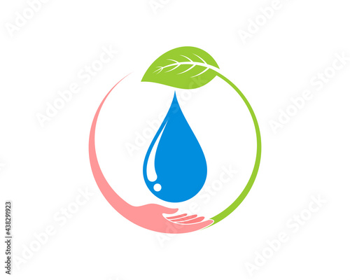 Hand take a fresh water drop with green leaf