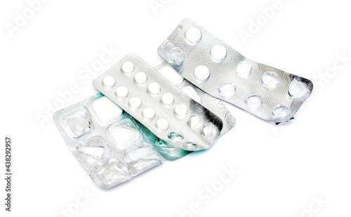 Tablets in a package on a white background