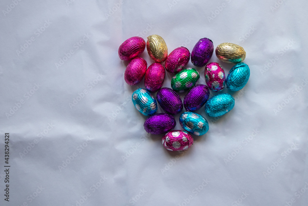 Close up of chocolate Easter eggs in the form of a heart. Close up of chocolate Easter eggs in the form of a heart.