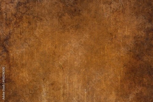 Grunge coffee brown distressed background, old paper textured layout of light center and dark vignette edges, old warm autumn background, grain illustration backdrop	