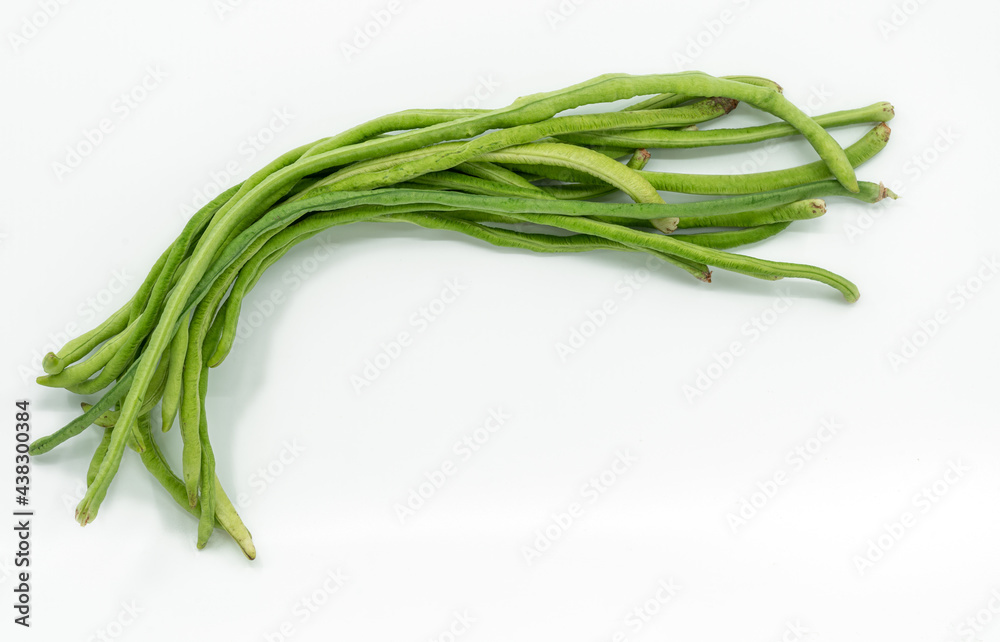 Bunch of fresh string bean or long bean or cow-pea on white background, top view image.