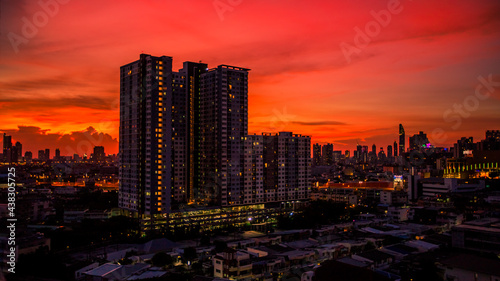 Highly blurred background from the residence with a panoramic view of the city condominium office home offices houses football fields bridges across the river  and colorful colors from the evening sky