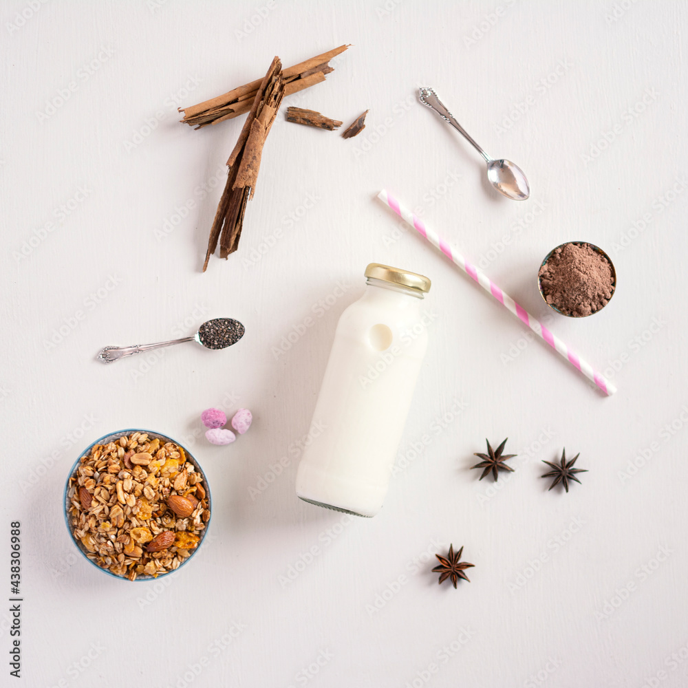 Almond milk bottle, top view. Lactose free dairy products, lactose free nut and grain milk, healthy food.