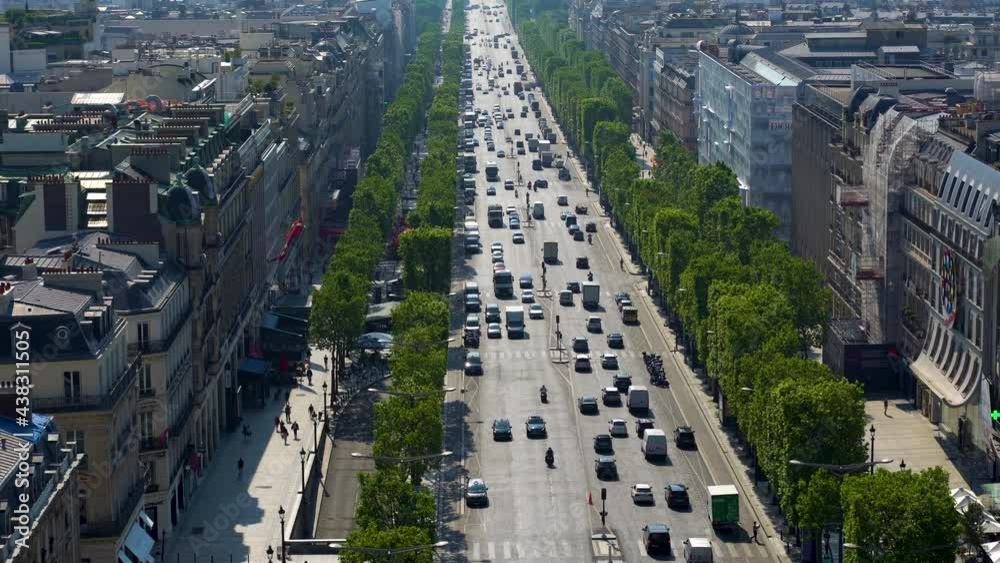 Paris, France: Aerial view of cars traffic on the Champs-Elysees Avenue; shot from the rooftop of the Arc de Triomphe