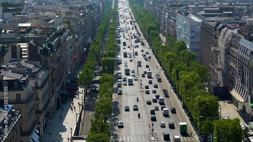 Paris, France: Aerial view of cars traffic on the Champs-Elysees Avenue; shot from the rooftop of the Arc de Triomphe