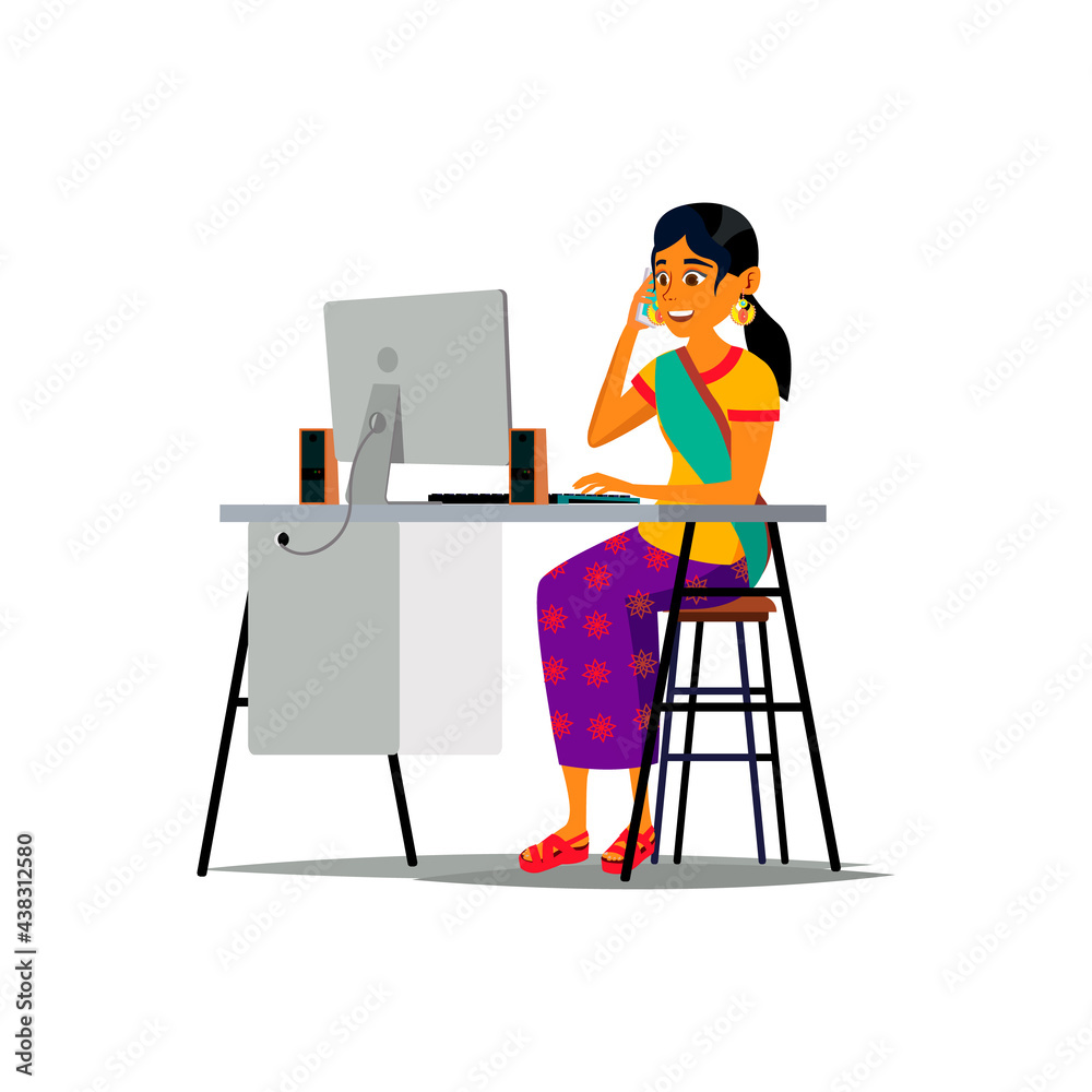 indian woman writing on computer and talking with friend on mobile ...