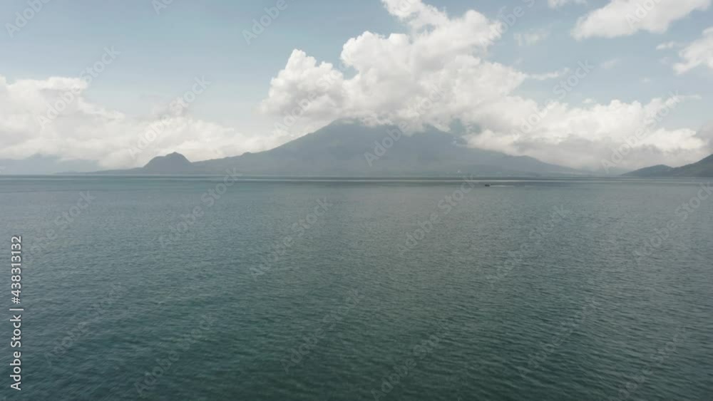 Volcano San Pedro seen from Atitlan Lake, Guatemala. Aerial panoramic view Volcano San Pedro seen from Atitlan Lake, Guatemala. Aerial panoramic view