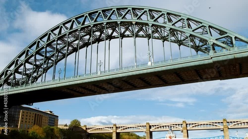 Close-up shot revealing the Tyne Bridge spanning the River Tyne between Newcastle and Gateshead, in Tyne and Wear, England, UK photo