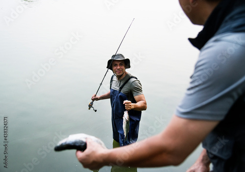 Men fishing at the lake