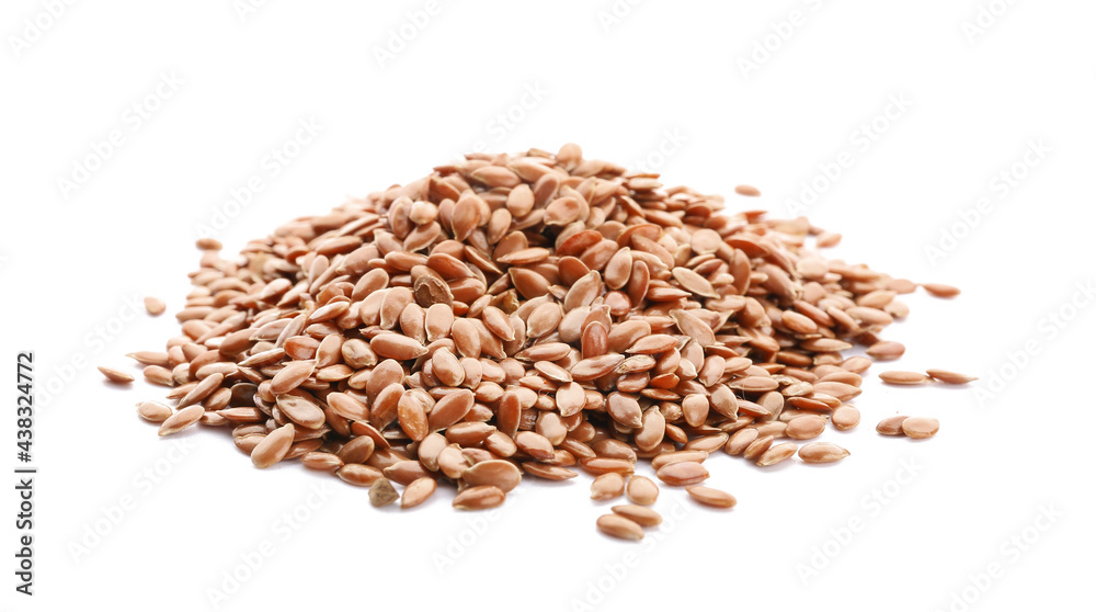 Obraz premium Heap of flax seeds on white background