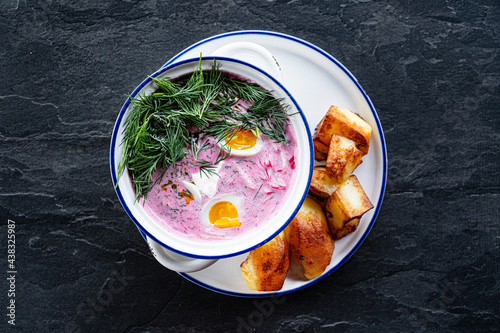 cold beetroot soup with baked potato photo