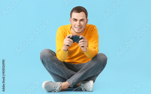 Young man playing video gam...