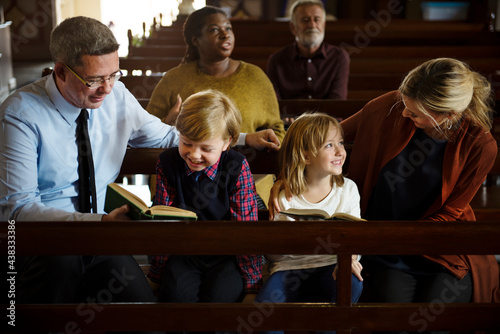 Принти на полотні A caucasian family in church