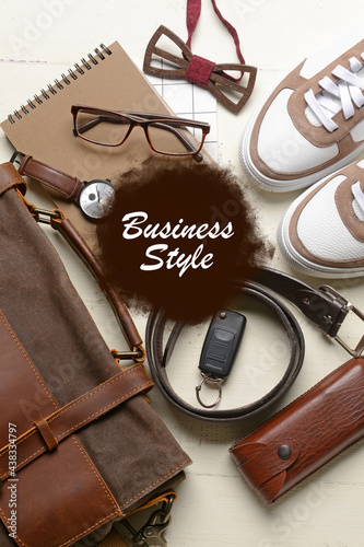 Stylish accessories of businessman on light background