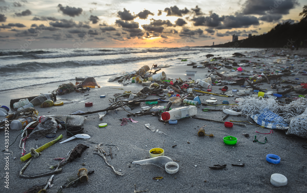 Dirty beach environment from plastic garbage.