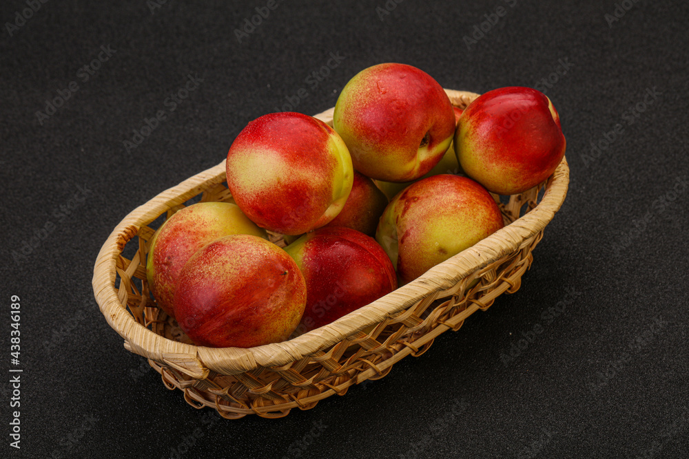 Sweet small nectarines in the basket Sweet small nectarines in the basket