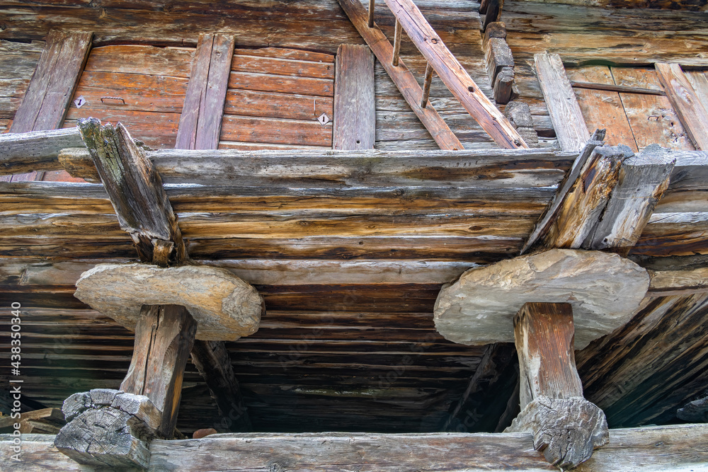 Supporting structure of a wooden house in Evolene in Switzerland Supporting structure of a wooden house in Evolene in Switzerland