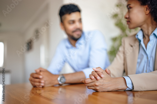 Adult couple, having a serious meaningful conversation.
