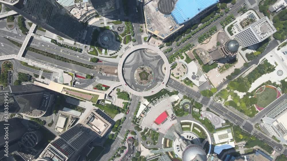 Drone aerial view of modern skyscraper and city road Shanghai downtown. Epic top view Lujiazui Shanghai. Business economy and travel concept b-roll footage office building exterior with modern design Drone aerial view of modern skyscraper and city road Shanghai downtown. Epic top view Lujiazui Shanghai. Business economy and travel concept b-roll footage office building exterior with modern design