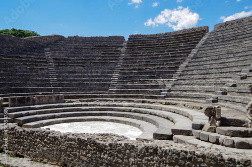 Famous landmark of ancient and historic city temple ruins with columns and walls on archeologic site museum Pompeji Pompeii excavation site in Italy near Naples and Vesuv Volcano photo