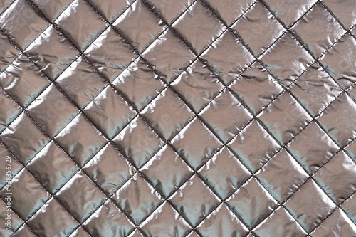 Billede på lærred surface of a silvery jacket fabric with padding polyester, background, texture
