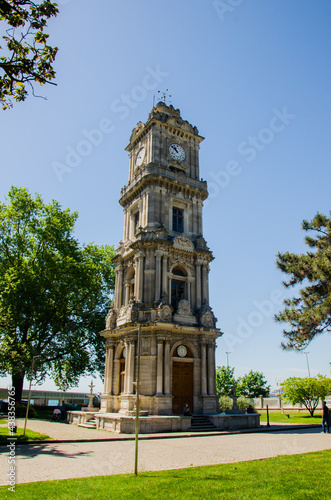 Clock tower in the Park of Dolmabahce palace in Istanbul, Turkey