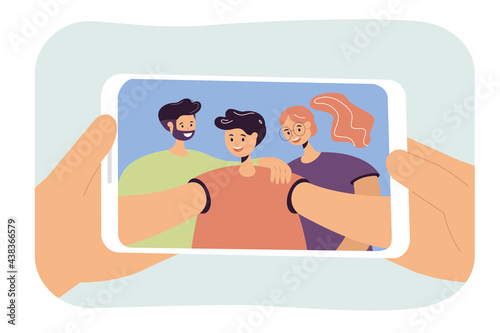 Young boy taking selfie with parents. Hands holding phone with photo of son, mother and father flat vector illustration. Family, relationship concept for banner, website design or landing web page