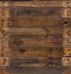 Old barn wood background texture. Vintage weathered rough planks with rusty nails.