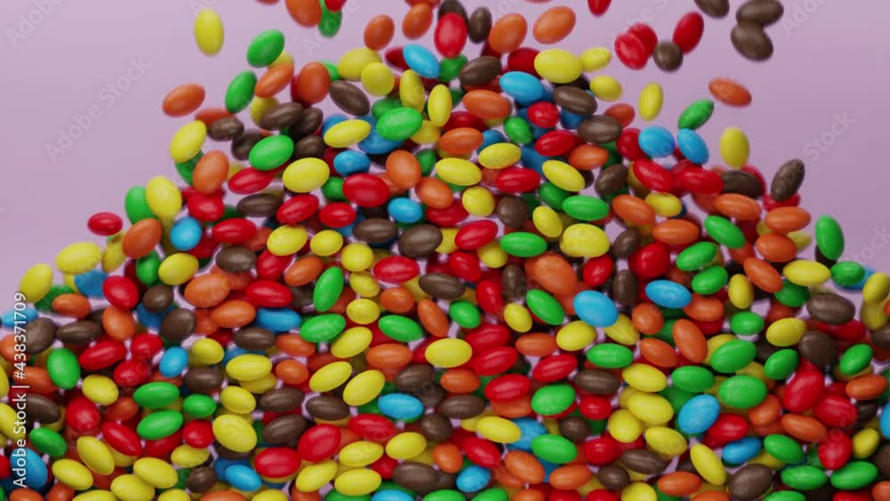 Bright and colorful candy beans or peanuts are falling down. Multicoloured tasty sugar sweets. Chocolate candies filling all the area. Close up. Red, green, yellow colors. Holiday mood. 3D Render 4K