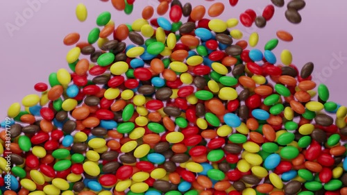 Bright and colorful candy beans or peanuts are falling down. Multicoloured tasty sugar sweets. Chocolate candies filling all the area. Close up. Red, green, yellow colors. Holiday mood. 3D Render 4K