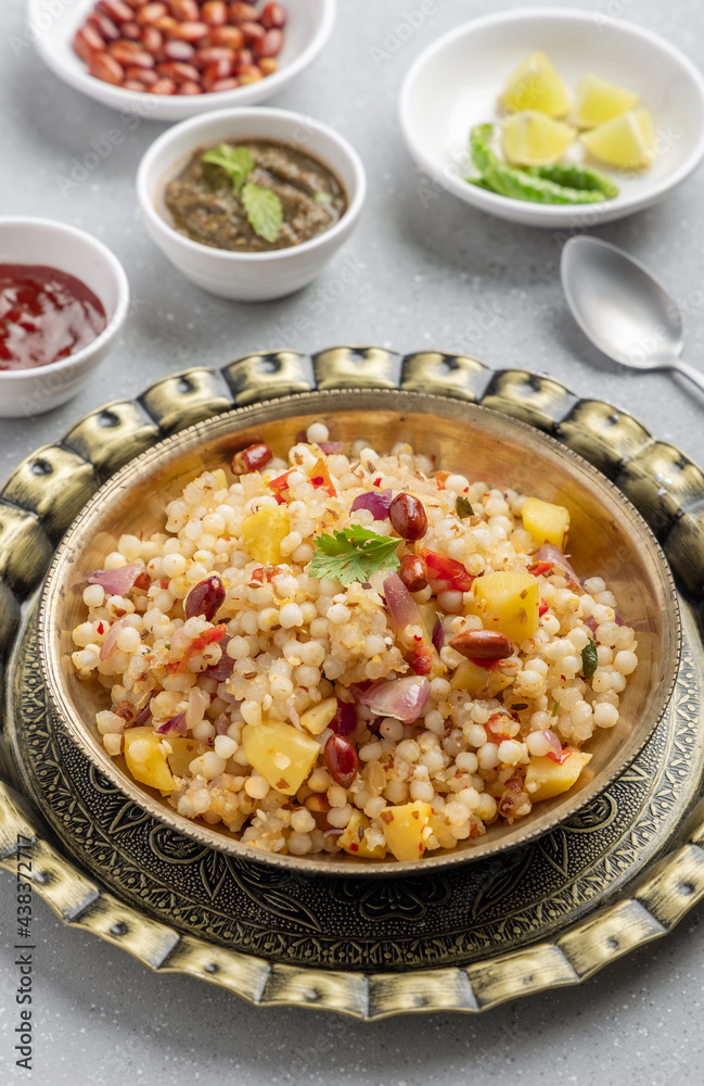 Sabudana khichdi is an Indian dish made from soaked sago or tapioca pearls Sabudana khichdi is an Indian dish made from soaked sago or tapioca pearls