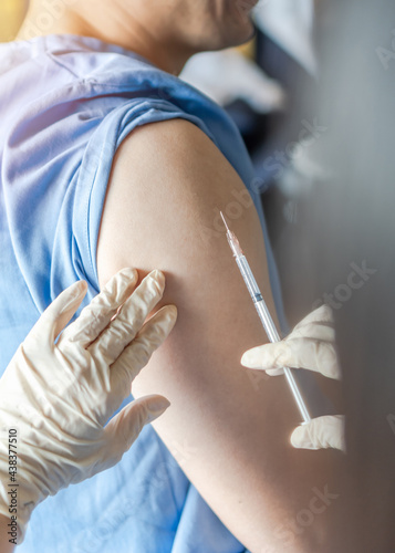 Vaccine for vaccination, medical immunization for adult man or male patient from disease such as covid-19, coronavirus, measles, HPV, Hepatitis B, Hepatitis A, meningitis, pertussis, pneumonia