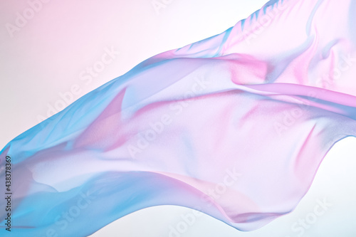 Fototapeta Smooth elegant colorful transparent cloth separated on white background