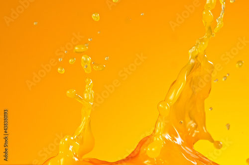 Pouring orange juice splash...