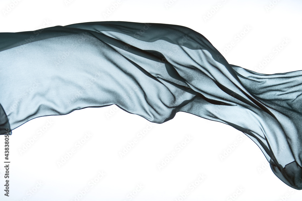 Smooth elegant colorful transparent cloth separated on white background. Texture of flying fabric. Smooth elegant colorful transparent cloth separated on white background. Texture of flying fabric.