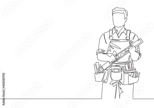 Single continuous line drawing of young handyman wearing building construction uniform while holding spirit level. Craftsman home repair service concept. One line draw design illustration