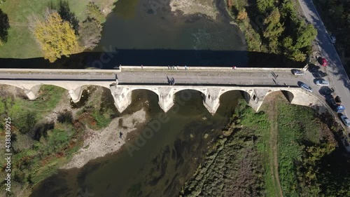 Aerial view of Nineteenth-century bridge over the Yantra River, known as the Kolyu Ficheto Bridge in Byala, Ruse region, Bulgaria photo