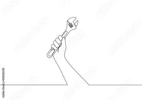 One continuous line drawing of man holding stainless steel wrench key. Handyman tools concept. Single line draw vector design illustration