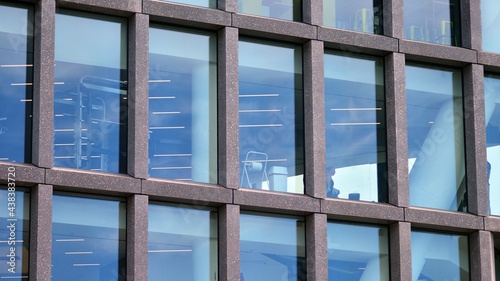 Abstract fragment of contemporary architecture  walls made of glass and concrete.