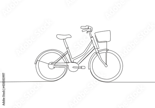 One single line drawing of girly classic roadster bicycle logo. Bike with basket at the front concept. Continuous line draw design vector illustration
