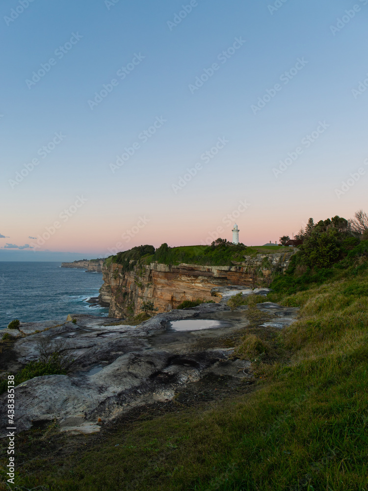 Ocean coastline and Macquarie Lighthouse in Sydney, Australia.