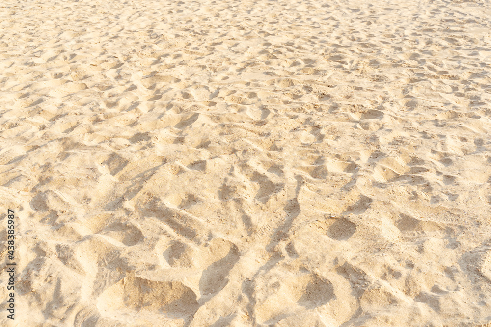 Sand on the beach for background. Brown beach sand texture as background. Sand on the beach for background. Brown beach sand texture as background.
